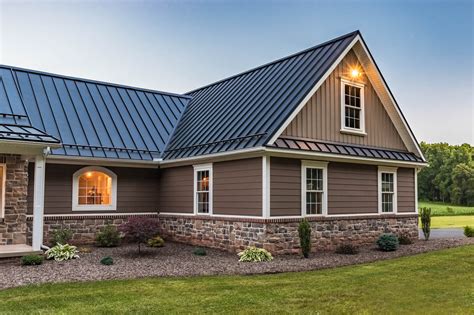 picture of brick houses with metal roofs|homes with brown metal roofs.